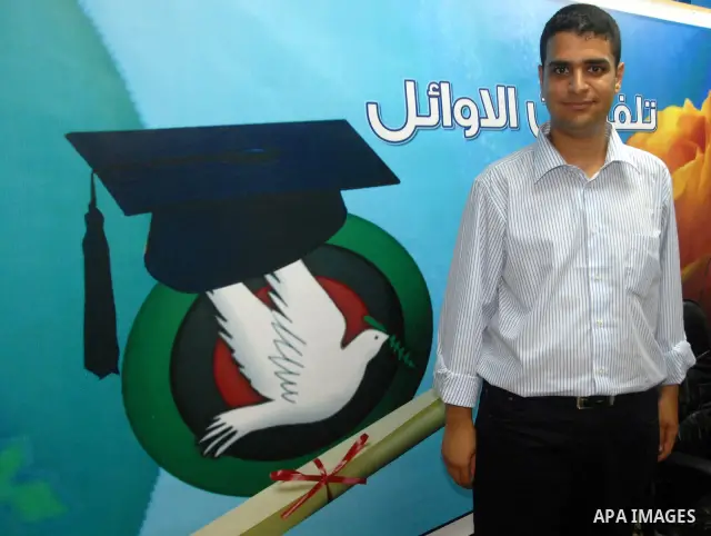 A Palestinian student from the top ten in the general secondary certificate in Palestine, Heil Farid Hosni Abdel Razek with average of 99.7 % , is greeted by his family in the West Bank city of Tulkarm , Sunday, July 24,...