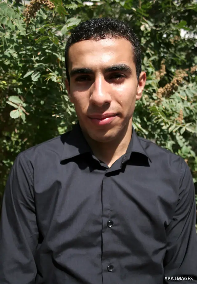A Palestinian student from the top ten in the general secondary certificate in Palestine, Mohammed Jafar Karki with average of 99.5 % , is greeted by his family in the West Bank city of Hebron , Sunday, July 24, 2011. Ph...