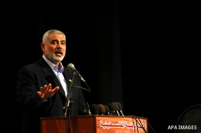 Palestinian Prime Minister in Gaza Strip, Ismail Haniya participates in a celebration in Gaza city on July 24,2011 to honor the students who gained the highest marks in the final high school exams, known as "Tawjihi" at...