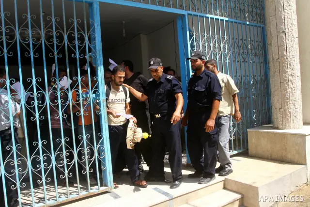 Palestinian prisoners prepare to be freed from a Hamas-run jail in Gaza City on July 25, 2011. Palestinian Hamas police released prisoners because of the approaching holy month of Ramadan. Photo by Ashraf Amra