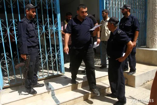 Palestinian prisoners prepare to be freed from a Hamas-run jail in Gaza City on July 25, 2011. Palestinian Hamas police released prisoners because of the approaching holy month of Ramadan. Photo by Ashraf Amra