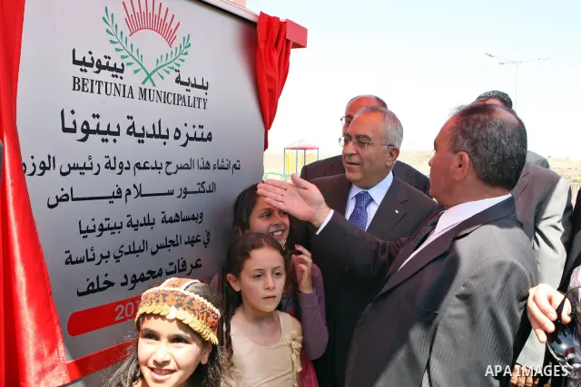 Palestinian Prime Minister, Salam Fayyad during the opening of the park municipality Beitunia in the West Bank city of Ramallah on July 25, 2011. Photo by Mustafa Abu Dayeh
