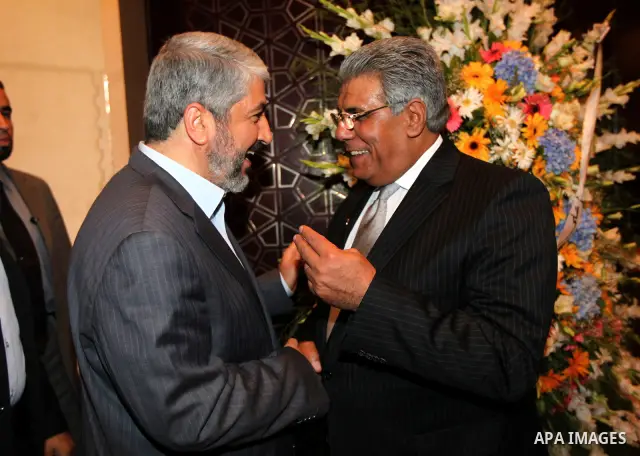 Palestinian Chairman of the political bureau of Hamas, Khaled Meshaal visits the Egyptian Embassy on the occasion of the anniversary of the July 23 Revolution in Cairo on July 25, 2011. Photo by Majd Majd