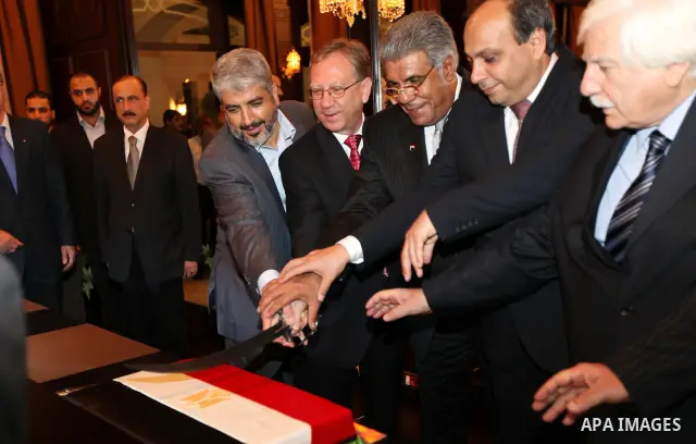 Palestinian Chairman of the political bureau of Hamas, Khaled Meshaal visits the Egyptian Embassy on the occasion of the anniversary of the July 23 Revolution in Cairo on July 25, 2011. Photo by Majd Majd
