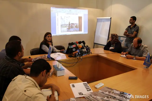 Representative of the Jerusalem office of the European Union speaks at a press conference about the achievements of the Union in the office of Gaza city on July 25, 2011. Photo by Mohammed Asad