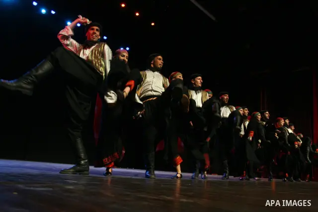 Palestinian folklore dance troupe perform during an annual cultural festival in the West Bank city of Ramallah on July 25, 2011. Photo by Issam Rimawi
