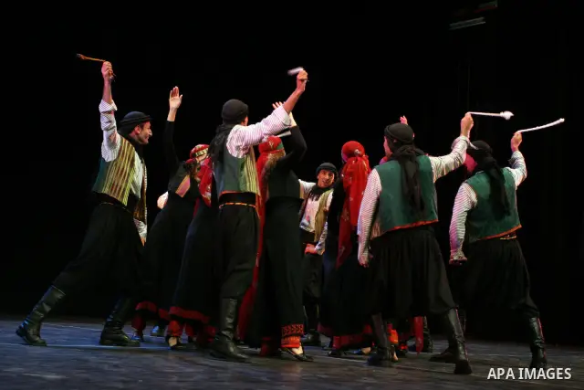 Palestinian folklore dance troupe perform during an annual cultural festival in the West Bank city of Ramallah on July 25, 2011. Photo by Issam Rimawi