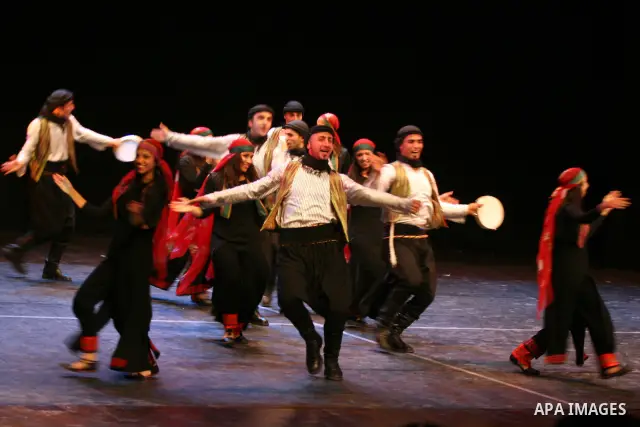 Palestinian folklore dance troupe perform during an annual cultural festival in the West Bank city of Ramallah on July 25, 2011. Photo by Issam Rimawi