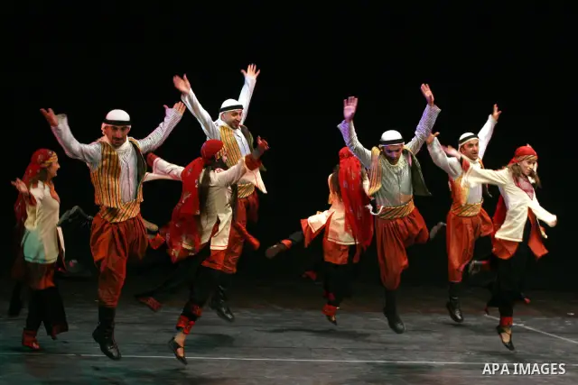 Palestinian folklore dance troupe perform during an annual cultural festival in the West Bank city of Ramallah on July 25, 2011. Photo by Issam Rimawi
