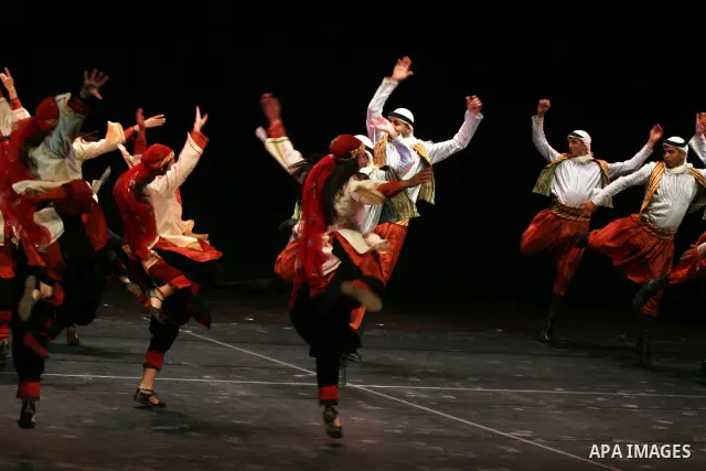 Palestinian folklore dance troupe perform during an annual cultural festival in the West Bank city of Ramallah on July 25, 2011. Photo by Issam Rimawi