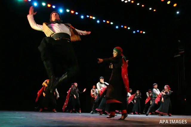 Palestinian folklore dance troupe perform during an annual cultural festival in the West Bank city of Ramallah on July 25, 2011. Photo by Issam Rimawi