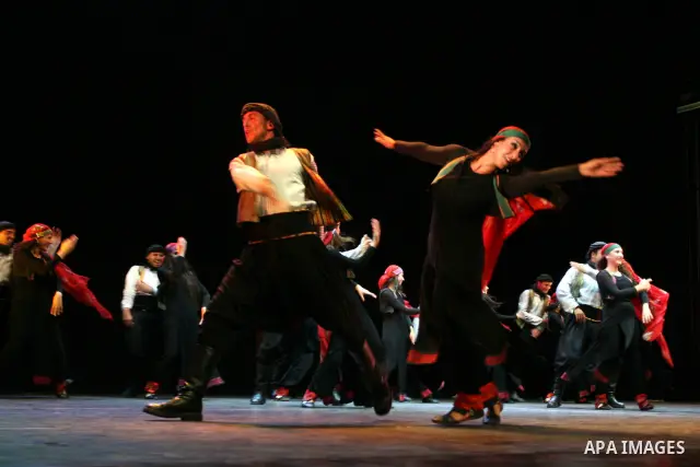 Palestinian folklore dance troupe perform during an annual cultural festival in the West Bank city of Ramallah on July 25, 2011. Photo by Issam Rimawi