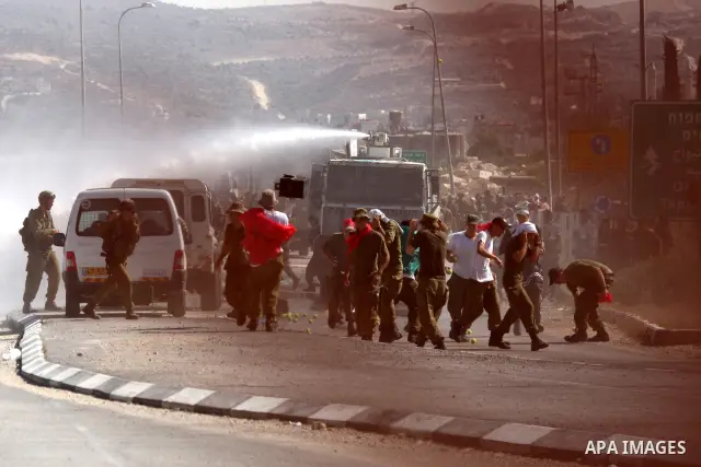 Israeli military forces during a training session at Hawara checkpoint near Nablus in the West Bank on July 26, 2011, where a riot in the Palestinian Authority. Photo by Wagdi Eshtayah