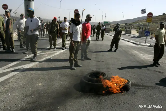 Israeli military forces during a training session at Hawara checkpoint near Nablus in the West Bank on July 26, 2011, where a riot in the Palestinian Authority. Photo by Wagdi Eshtayah