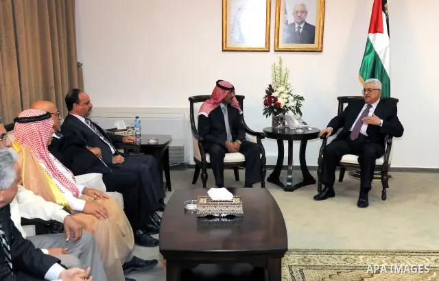 Palestinian President Mahmoud Abbas (Abu Mazen) meets with a delegation from the Jordanian Hashemite Charity Organization in the West Bank city of Ramallah on July 28, 2011. Photo by Thaer Ganaim