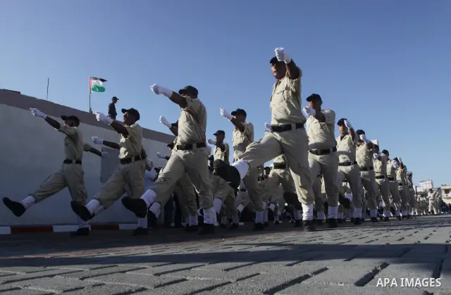 Palestinian Hamas security forces march during a graduation ceremony at the Ansar police compound in Gaza City on July 28, 2011. Photo by Naaman Omar