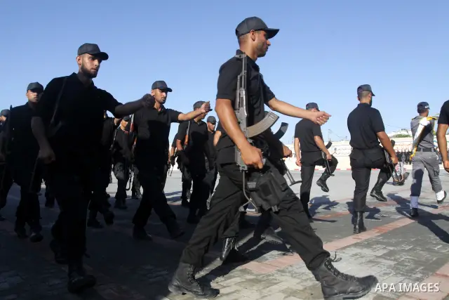 Palestinian Hamas security forces march during a graduation ceremony at the Ansar police compound in Gaza City on July 28, 2011. Photo by Naaman Omar