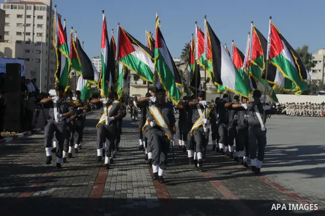 Palestinian Hamas security forces march during a graduation ceremony at the Ansar police compound in Gaza City on July 28, 2011. Photo by Naaman Omar
