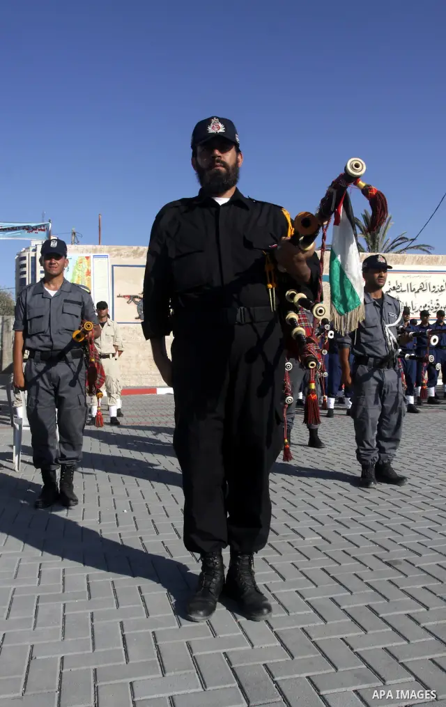 Palestinian Hamas security forces march during a graduation ceremony at the Ansar police compound in Gaza City on July 28, 2011. Photo by Naaman Omar