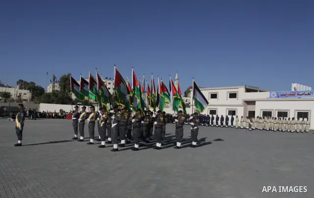 Palestinian Hamas security forces march during a graduation ceremony at the Ansar police compound in Gaza City on July 28, 2011. Photo by Naaman Omar