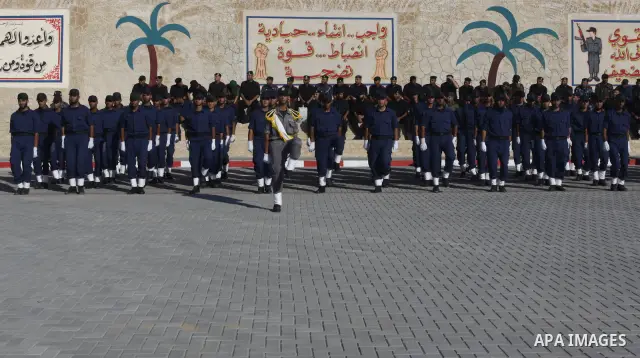 Palestinian Hamas security forces march during a graduation ceremony at the Ansar police compound in Gaza City on July 28, 2011. Photo by Naaman Omar