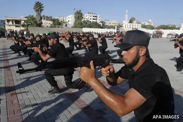 Palestinian Hamas security forces show their skills during a graduation ceremony at the Arafat police compound in Gaza City on July 28, 2011. Photo by Naaman Omar
