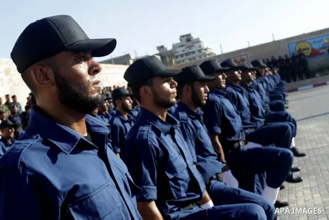 Palestinian Hamas security forces march during a graduation ceremony at the Ansar police compound in Gaza City on July 28, 2011. Photo by Naaman Omar