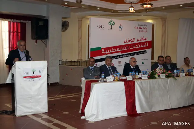 Palestinian Prime Minister, Salam Fayyad during the closing session of al-wafaa` conference of the Palestinian products in the West Bank city of Qalqilya on July 28, 2011. Photo by Mustafa Abu Dayeh