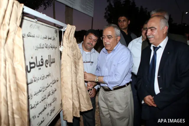 Palestinian Prime Minister, Salam Fayyad during the opening of the street paving project Kafr third-Manor Salman in the West Bank on July 28, 2011. Photo by Mustafa Abu Dayeh