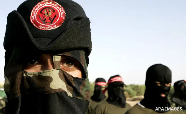 Militants of the Democratic Front for Liberation Palestine (DFLP) train during a military graduation ceremony in Rafah, southern Gaza Strip, on July 29, 2011. Photo by Abed Rahim Khatib