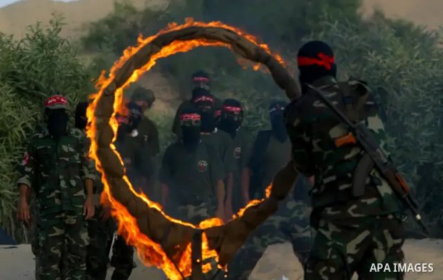 Militants of the Democratic Front for Liberation Palestine (DFLP) train during a military graduation ceremony in Rafah, southern Gaza Strip, on July 29, 2011. Photo by Abed Rahim Khatib