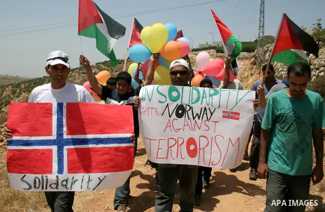 Palestinian protesters argue with Israeli soldiers during a demonstration against Israel's controversial separation barrier in the West Bank village of Beit Omar, near Hebron, 30 July 2011. Israel says the network of ste...