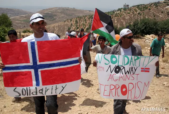 Palestinian protesters argue with Israeli soldiers during a demonstration against Israel's controversial separation barrier in the West Bank village of Beit Omar, near Hebron, 30 July 2011. Israel says the network of ste...