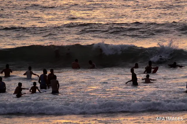 Palestinians enjoy swimming at the beach in Gaza city on July 30, 2011. Photo by Mohammed Asad