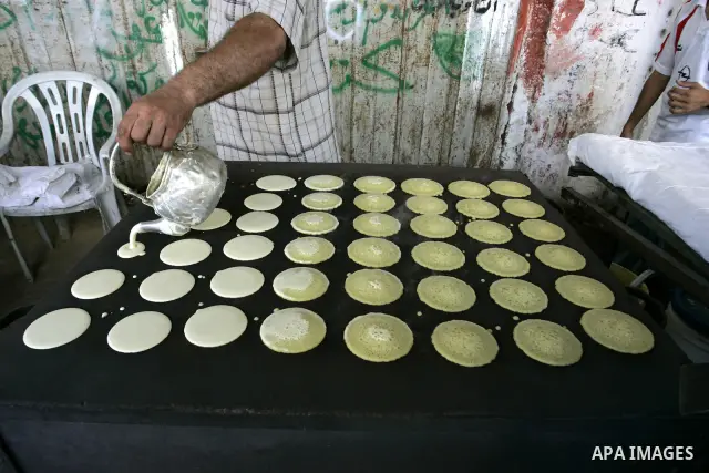 A Palestinian makes (Velours) on the first day of holy fasting month of Ramadan in the town of Rafah, southern Gaza Strip on Aug. 1, 2011. Throughout the holy month of Ramadan devout Muslims must abstain from food, drink...
