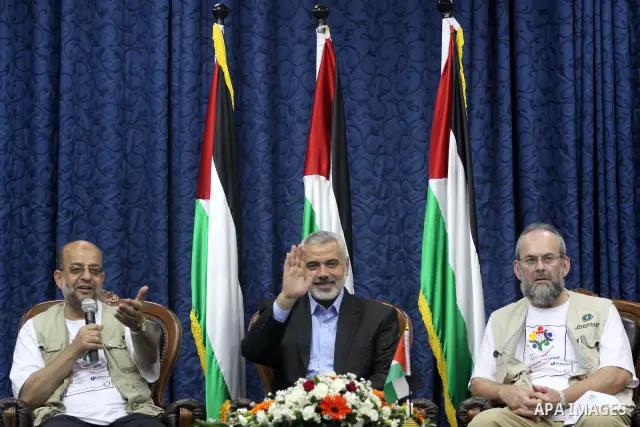 Palestinian Prime Minister in Gaza strip, Ismail Haniya during a meeting with members of the aid convoy 'Miles of Smiles 4' in Gaza city on Aug. 1, 2011 . The convoy, including 35 activists from Spain, the UK and Bahrain...