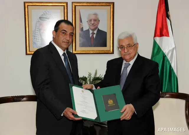 Palestinian President Mahmoud Abbas (Abu Mazen) grants Order of Merit and Excellence for Adnan Mujally, in the West Bank city of Ramallah on Aig. 1, 2011. Photo by Mohammed Ateeq
