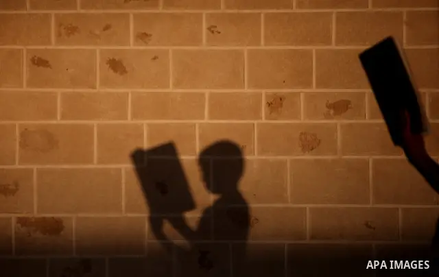 Palestinian boys read the Koran at the al-Omari mosque in Gaza City on the first day of the Muslim holy fasting month of Ramadan on 01 August 2011. Muslims throughout the world are celebrating the holy fasting month of R...