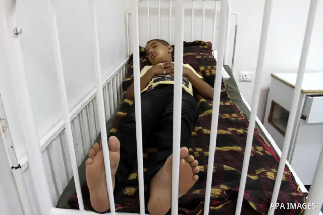 A Palestinian Thalassemia patient recieves treated, during a protest for the lack of medicine at Al-Rantisi hospital for the children, in Gaza city on Aug. 3, 2011, demanding for the introduction of medicines. Photo by M...