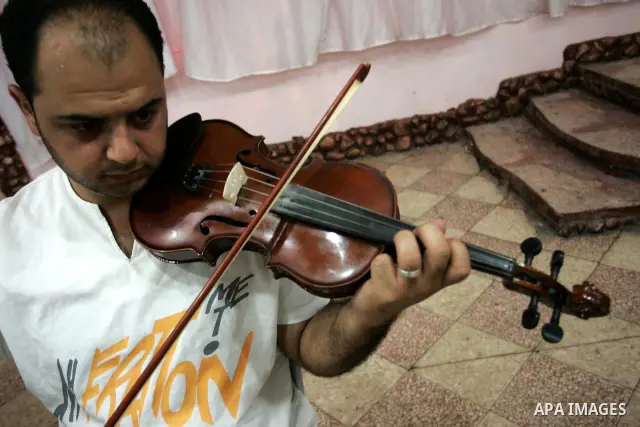 Palestinian musical band perform rehearsals in Khan Younis, southern Gaza Strip on Aug. 3, 2011. Photo by Abed Rahim Khatib