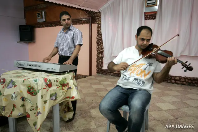 Palestinian musical band perform rehearsals in Khan Younis, southern Gaza Strip on Aug. 3, 2011. Photo by Abed Rahim Khatib
