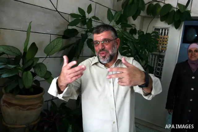 A Palestinian commander of the Hamas Islamist movement, Sheikh Hassan Yusef, 56, explain his story in israeli jails in the West Bank city of Ramallah after he was released from an Israeli jails, on Aug. 4, 2011. as Israe...