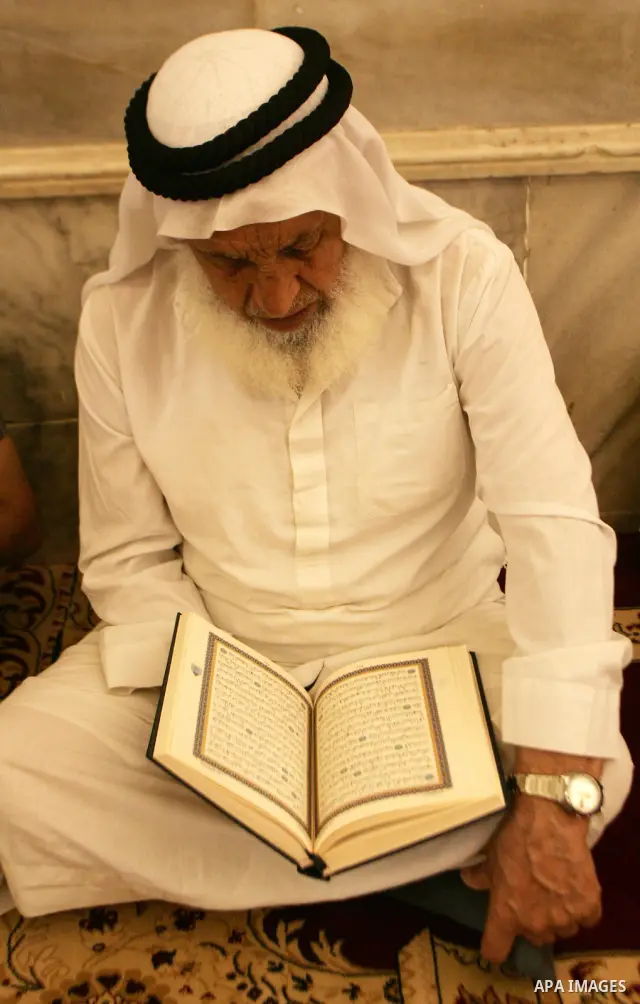 A Palestinian man reads the holy koran on the first day of holy fasting month of Ramadan in Jerusalem. Throughout the holy month of Ramadan devout Muslims must abstain from food, drink and sex from dawn until sunset when...