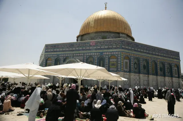 Palestinians Muslims pray in front of the Dome of the Rock on the compound known to Muslims as al-Haram al-Sharif during the first Friday of the holy month of Ramadan in Jerusalem's Old City August 5, 2011. Muslims aroun...