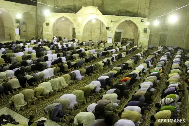 Palestinian Muslims pray al-Taraweeh prayer at al-Omari Mosque during the first Friday of the holy month of Ramadan in Gaza city on Aug. 5, 2011. Photo by Mohammed Asad