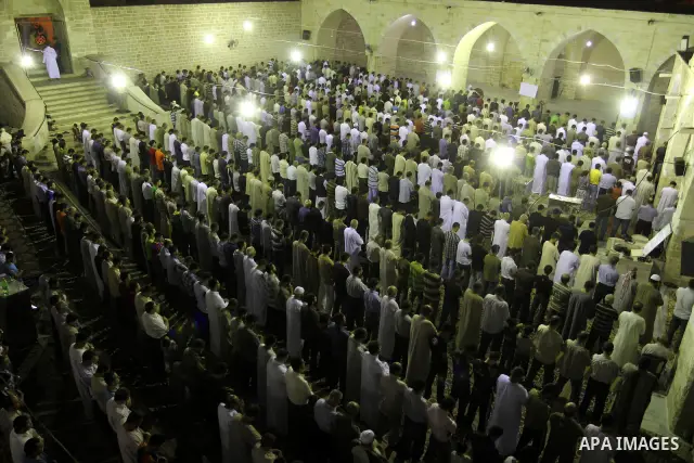 Palestinian Muslims pray al-Taraweeh prayer at al-Omari Mosque during the first Friday of the holy month of Ramadan in Gaza city on Aug. 5, 2011. Photo by Mohammed Asad