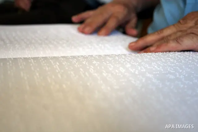 A Palestinian old man, Abdel Fattah Mubarak, 67 years, reads the holy koran in Braille at a Mosque in the West Bank city of Ramallah, on Aug. 7, 2011. Muslims around the world are observing the holy fasting month of Rama...