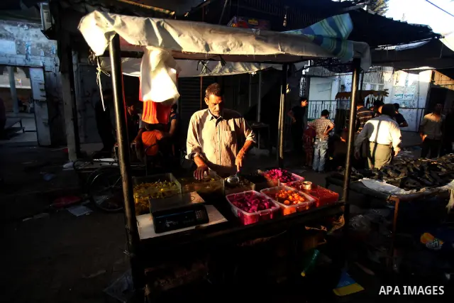 Palestinian kids sleep on a donkey cart in the market before Palestinians break their fast on the first Friday of Ramadan in the Jabaliya Refugee Camp in the northern Gaza Strip on 07 August 2011 Muslims throughout the w...