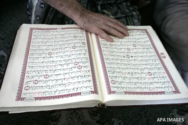 A Palestinian Muslim reads the holy Koran at a Mosque in Rafah, southern Gaza Strip on Aug. 9, 2011. Muslims around the world refrain from eating, drinking and sexual intercourse from dawn till dusk during Ramadan, the h...