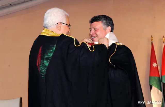 Palestinian President Mahmoud Abbas (Abu Mazen) during the granting of his Majesty King Abdullah II an honorary doctorate in Amman on Aug. 9, 2011. Photo by Thaer Ganaim